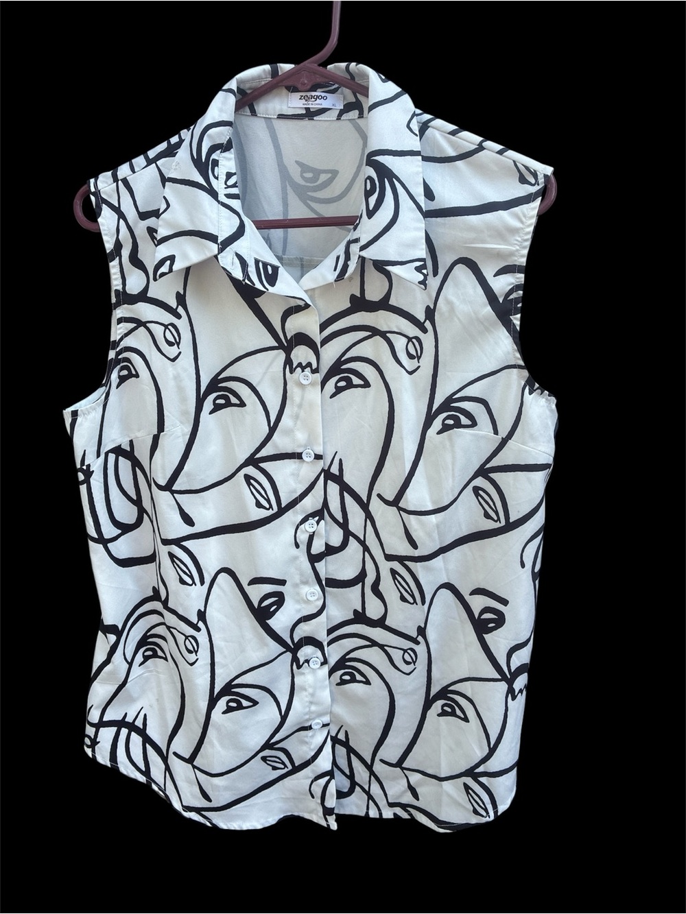zeagoo Sleeveless Button-Down Top in White with Black Abstract Face Print
